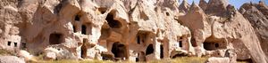 Chambers cut into the soft tuff cones of a Cappadocian valley, the landscape that holds hundreds of rock-cut churches