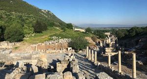 Curetes Street at Ephesus in the early morning, before the day’s groups arrive, with the white roof over the Terrace Houses on the hillside