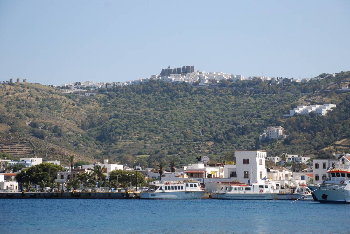 The harbor of Skala on Patmos, with the fortified Monastery of St. John on the hill of Chora above the white town