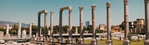 The Corinthian colonnade of the Roman agora of Smyrna, with the rooftops of modern İzmir behind it